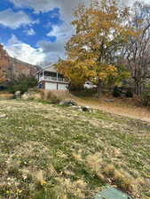 View of yard featuring a garage
