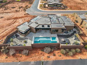 View of subject property with a pool area