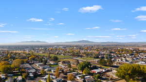 Aerial view of residential area featuring a mountain backdrop