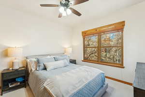 Bedroom featuring carpet floors and a ceiling fan