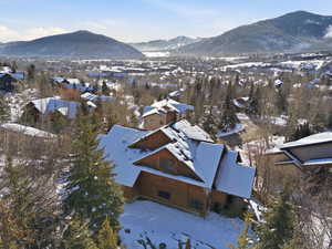 Snowy aerial view with a mountain view