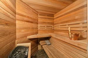 Relaxing sauna with wooden ceiling and wooden walls