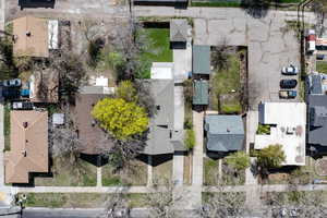 Aerial view of property's location with nearby suburban area