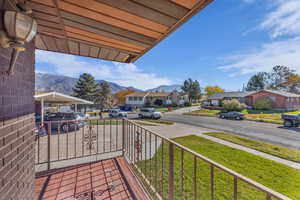 Balcony with a mountain view and a residential view