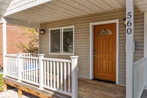 Property entrance featuring a porch