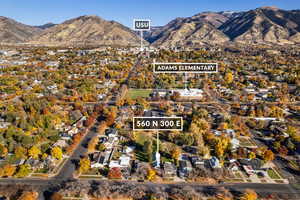 View of mountain background featuring nearby suburban area