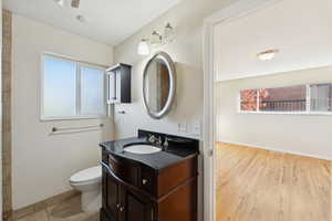 Bathroom featuring vanity and light wood-style flooring