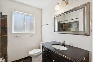 Bathroom with vanity and a shower