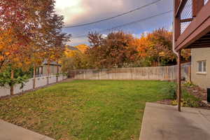 View of fenced backyard