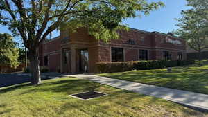 View of front of home featuring a front lawn