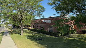 View of front of property featuring a front lawn
