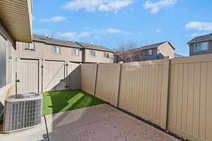 Private, fenced backyard with turf and patio