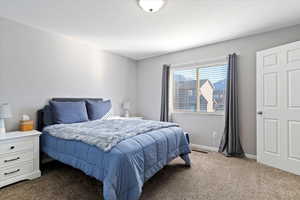 Spacious primary suite features an en-suite bath and two walk-in closets
