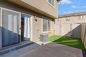 Private, fenced backyard with turf and patio, right off dining area!