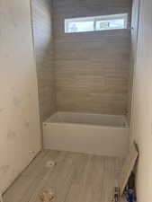 Bathroom featuring shower / tub combination