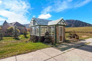 View of greenhouse and a mountain view