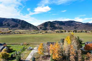 Mountain view with Nordic Valley resort views, rural landscape and agricultural land