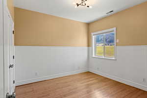 Unfurnished third bedroom with shared bathroom