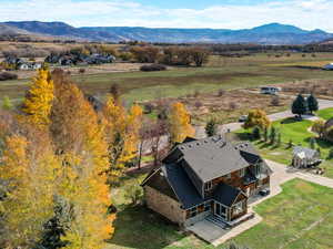 Aerial view of sparsely populated area with a mountain backdrop