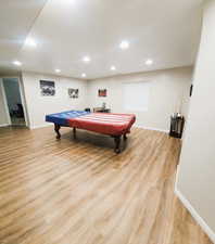 Recreation room featuring pool table, light wood-style flooring, and recessed lighting