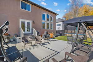 View of patio / terrace featuring a trampoline, french doors, and entry steps
