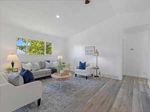 Living room with vaulted ceilings