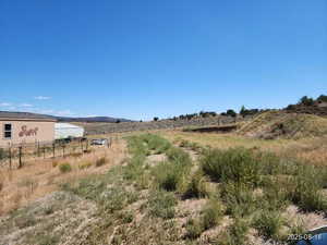 View of yard with a view of rural / pastoral area