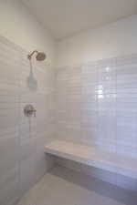 Full bath with tiled shower