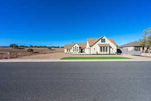 View of front of home featuring stucco siding