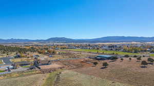 View of mountain background featuring rural landscape