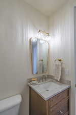 Bathroom with vanity and toilet