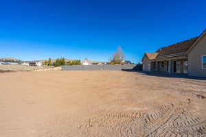 View of yard with a patio