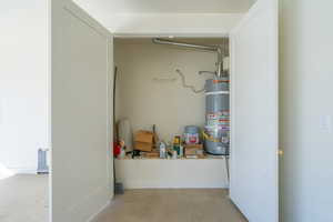Interior space featuring secured water heater