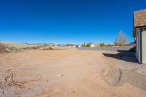 View of yard with a mountain view