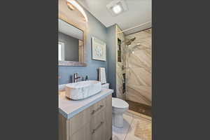 Completely updated bathrooms w/ stylish tile surrounds and modern finishes