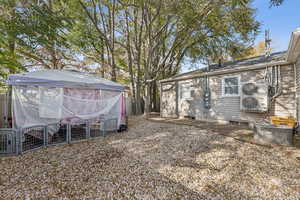 View of yard featuring exterior structure and an outdoor structure
