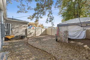 View of fenced backyard