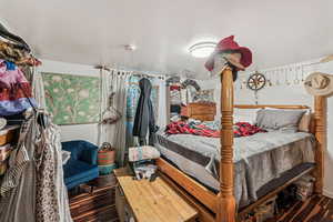 Bedroom featuring wood finished floors