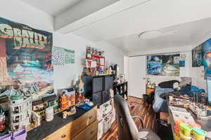 Office with dark wood finished floors