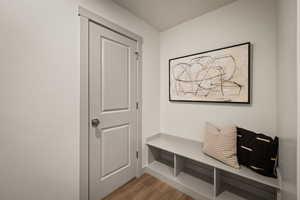 Mudroom with wood finished floors