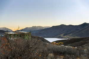 View of mountain background featuring a large body of water