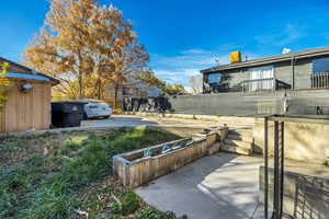 View of yard featuring stairway