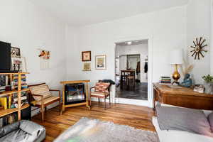 Living area featuring wood finished floors