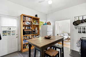 Dining room featuring ceiling fan