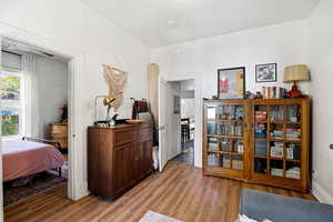 Bedroom with light wood-style floors