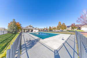 View of community pool and patio area