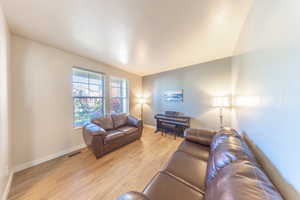 Front living area featuring light wood-type flooring
