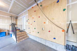 View of garage with included climbing wall!