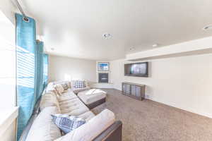 Basement great room with cozy gas fireplace!