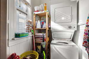 Laundry area with stacked washer / drying machine
